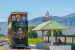 explore-wine-estates-onboard-vintage-style-wine-tram-franschhoek-south-africa