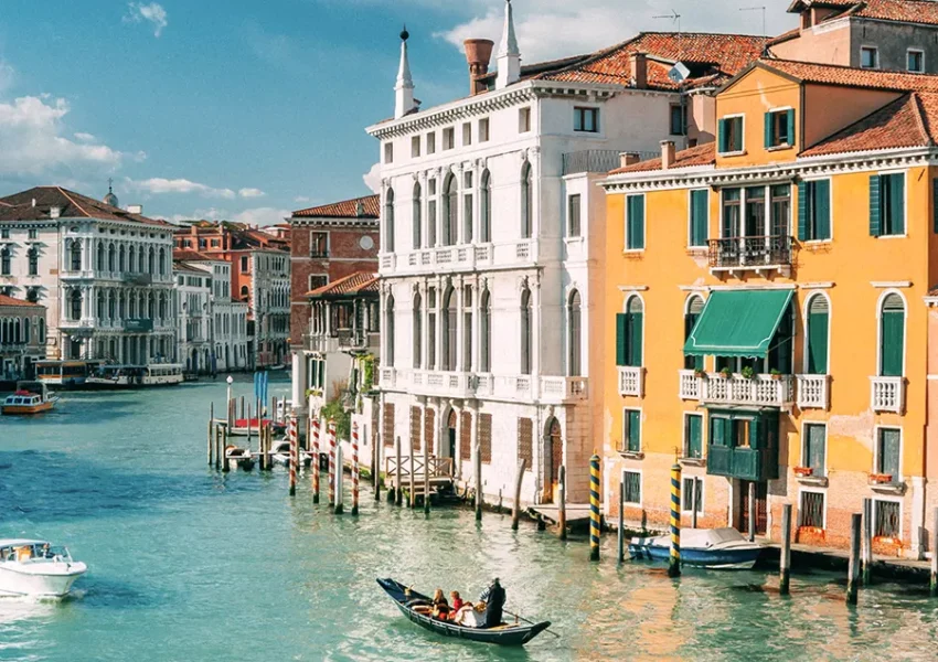 view-of-multi-colored-houses-by-canal-538849877-9